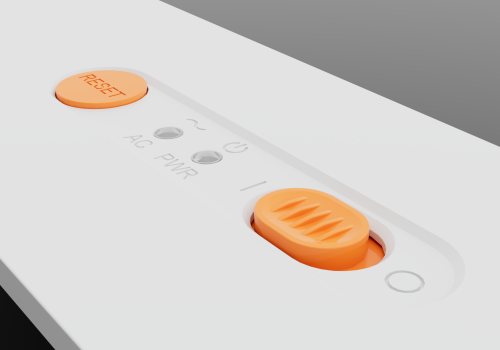Close-up of a white control panel featuring an orange reset button and an orange grooved rotary dial, with faint text and icons nearby.