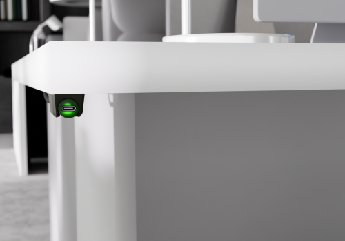 PIton USB adaptor in black under a white desk