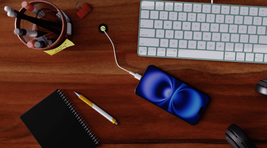 piton usb extension mounted in desk surface with bezel, charging a phone