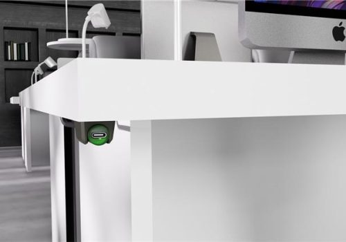 piton mounted underneath a white desk